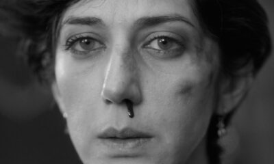 Two people exchanging saliva